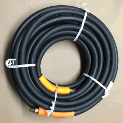 Black rubber air line hose with brass threaded male fittings.